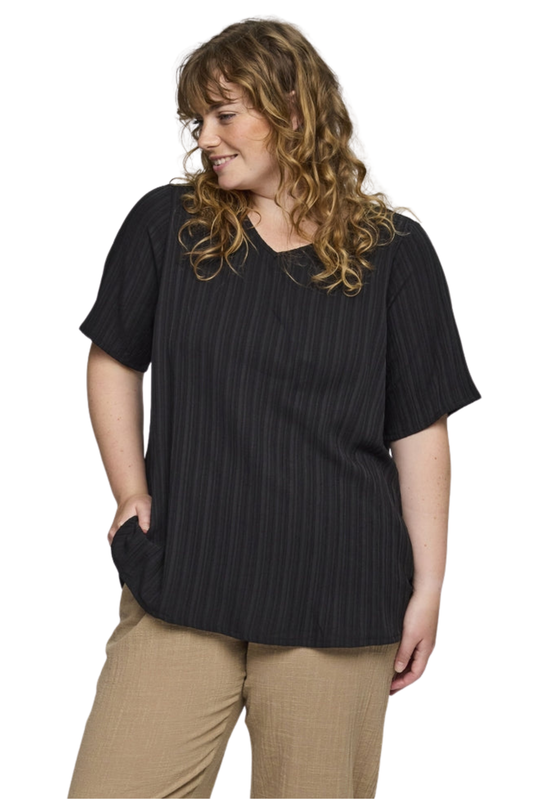 April blusa svørt